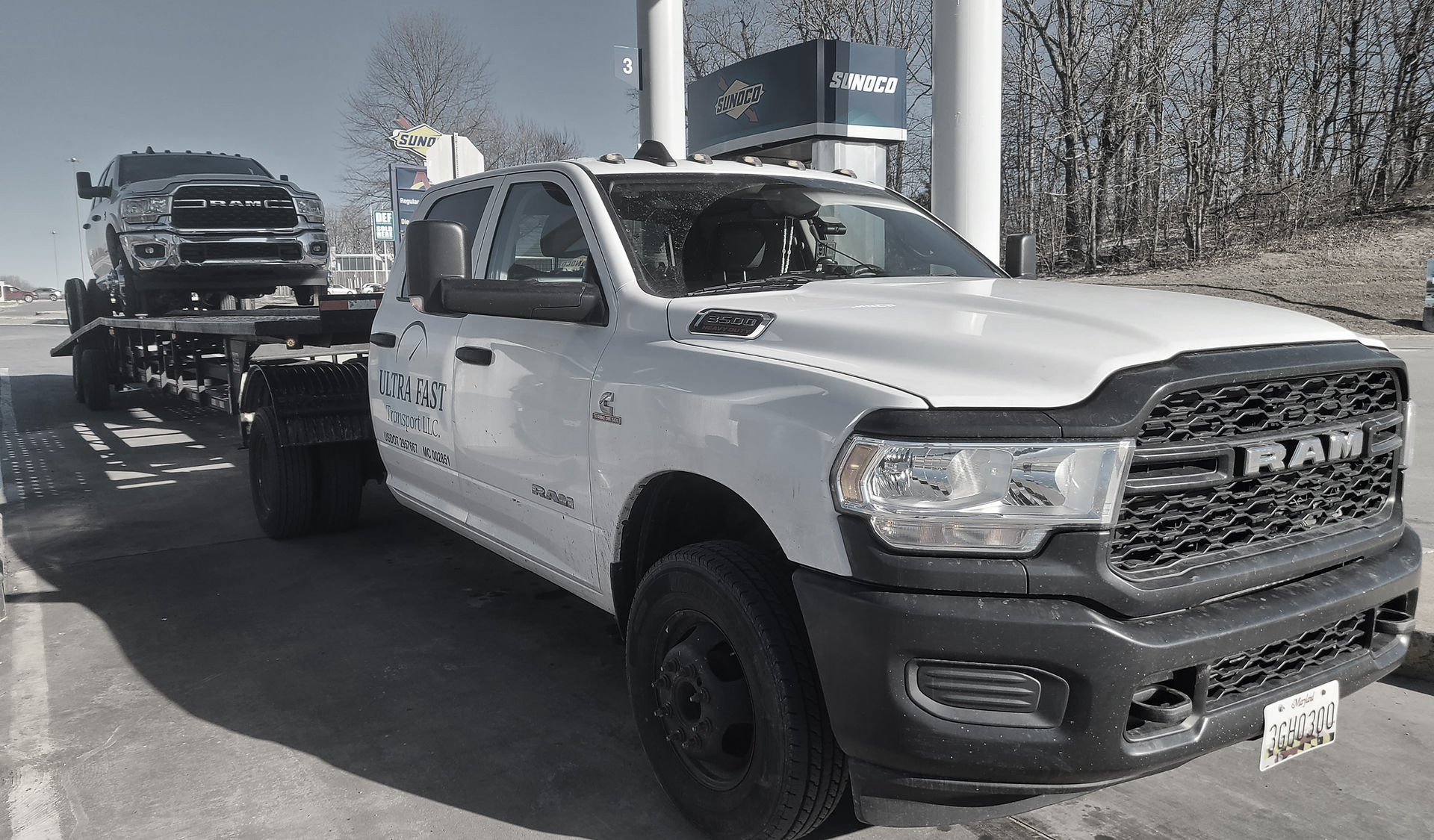 Ultra Fast Transport LLC truck carrying vehicles